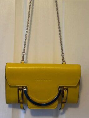 Small yellow handbag by Coccinelle